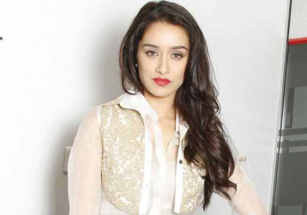 Shraddha Kapoor makeup product red hair color brown skin tone face shape