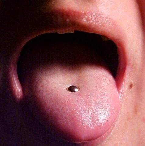 tongue being pierced 